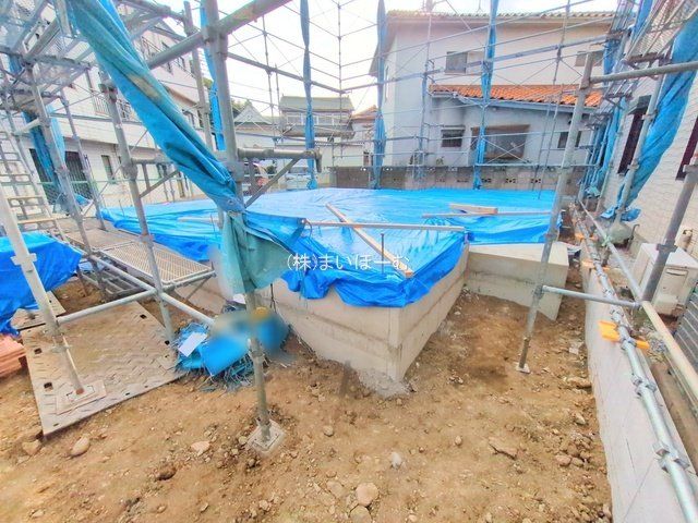 ��ʌ�����s���̉�1���ڂ̐V�z��ˌ��Ă̌��n�O�ώʐ^